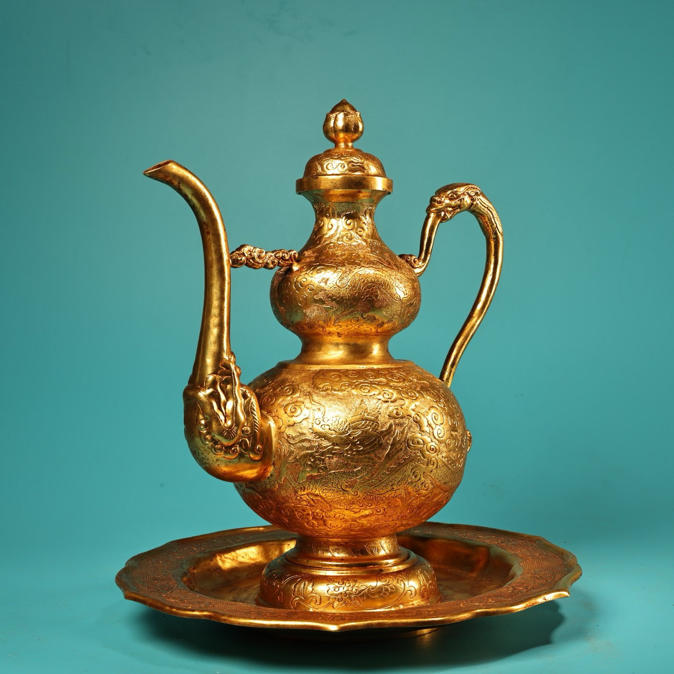 A set of Chinese antique pure copper high relief carved gourd wine pot with plates and wine utensils