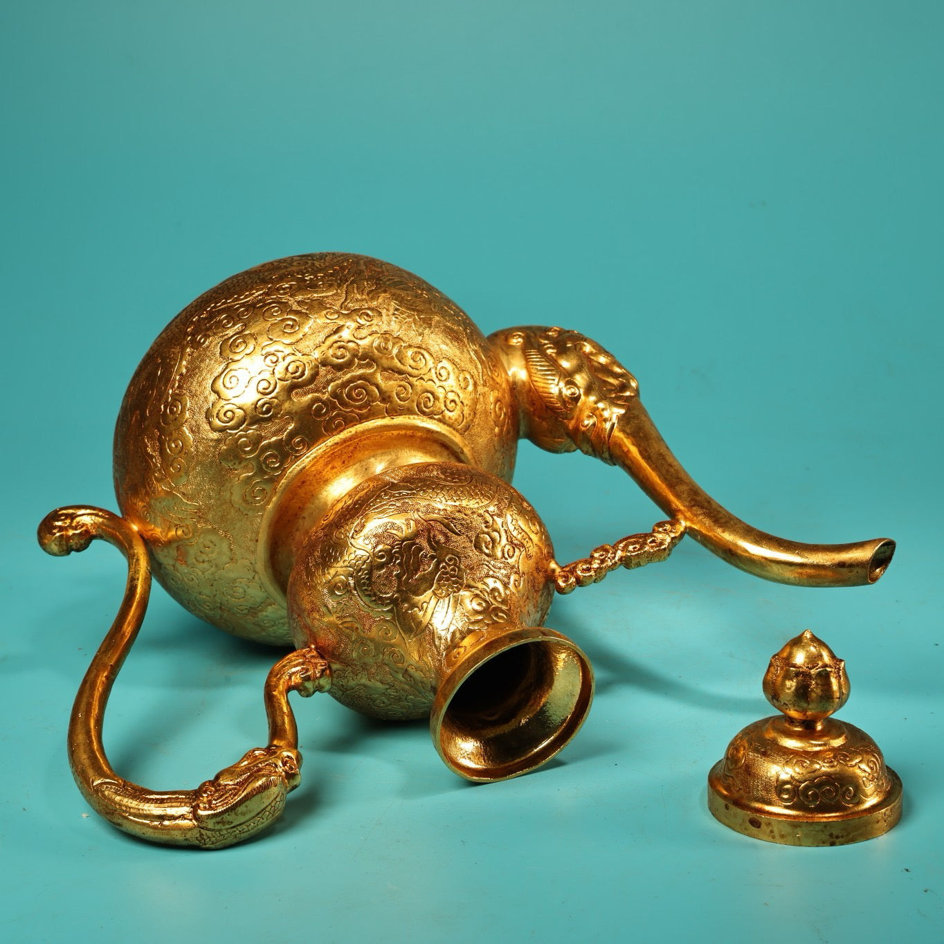 A set of Chinese antique pure copper high relief carved gourd wine pot with plates and wine utensils