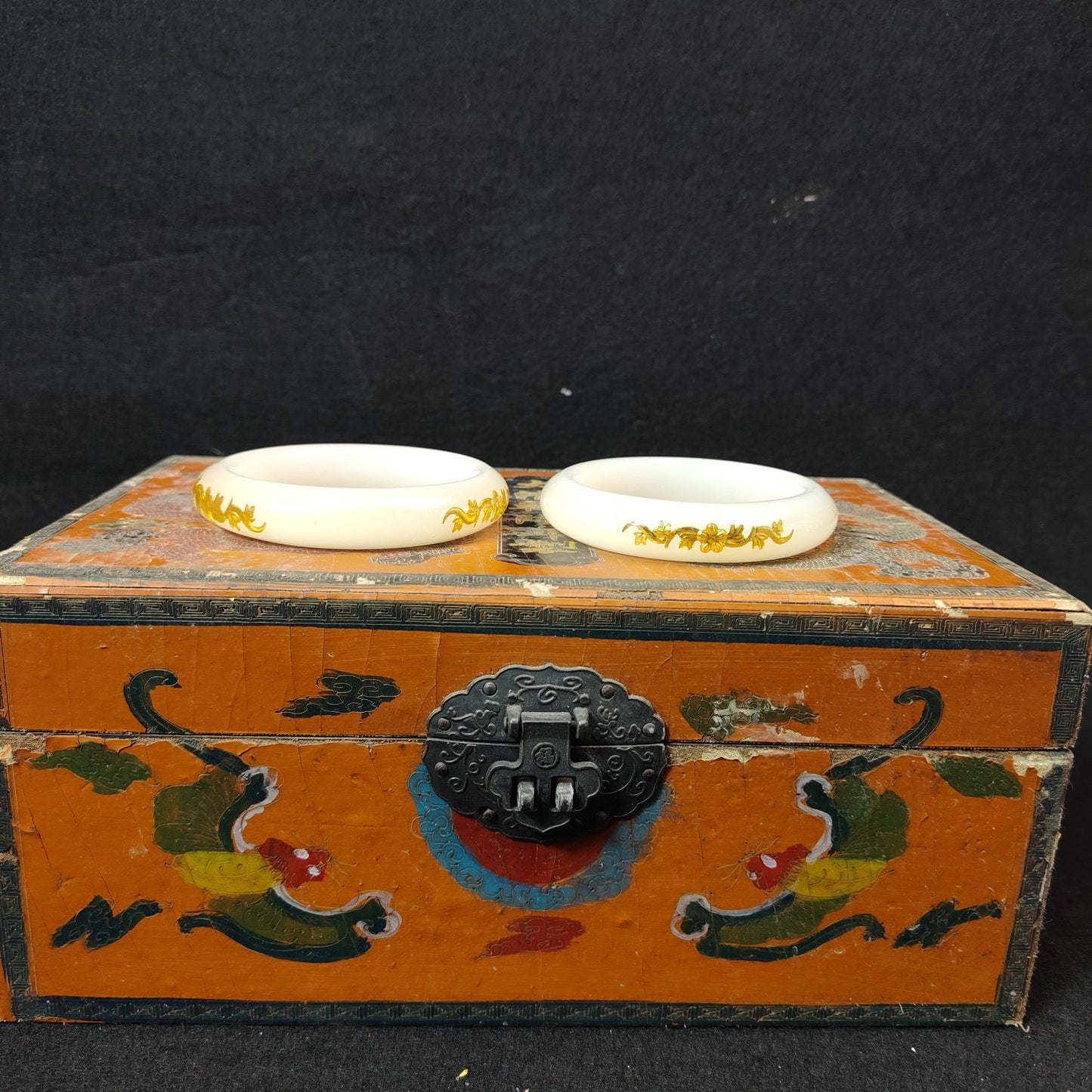 A box of Chinese antique white jade inner carved bracelets