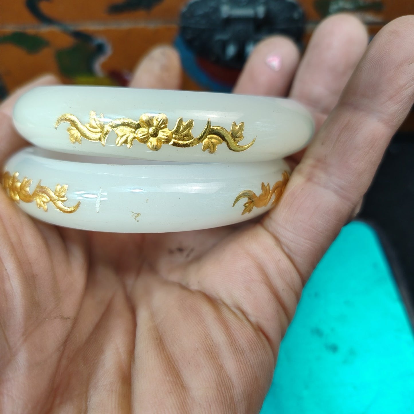 A box of Chinese antique white jade inner carved bracelets