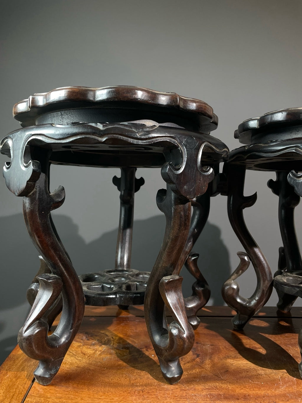 A pair of sandalwood windhead flower rack ornaments