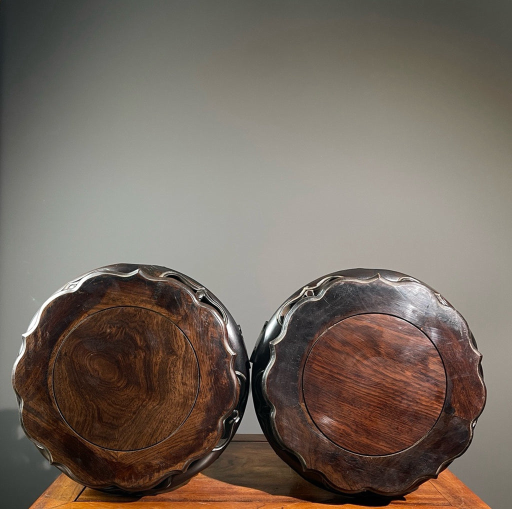 A pair of sandalwood windhead flower rack ornaments