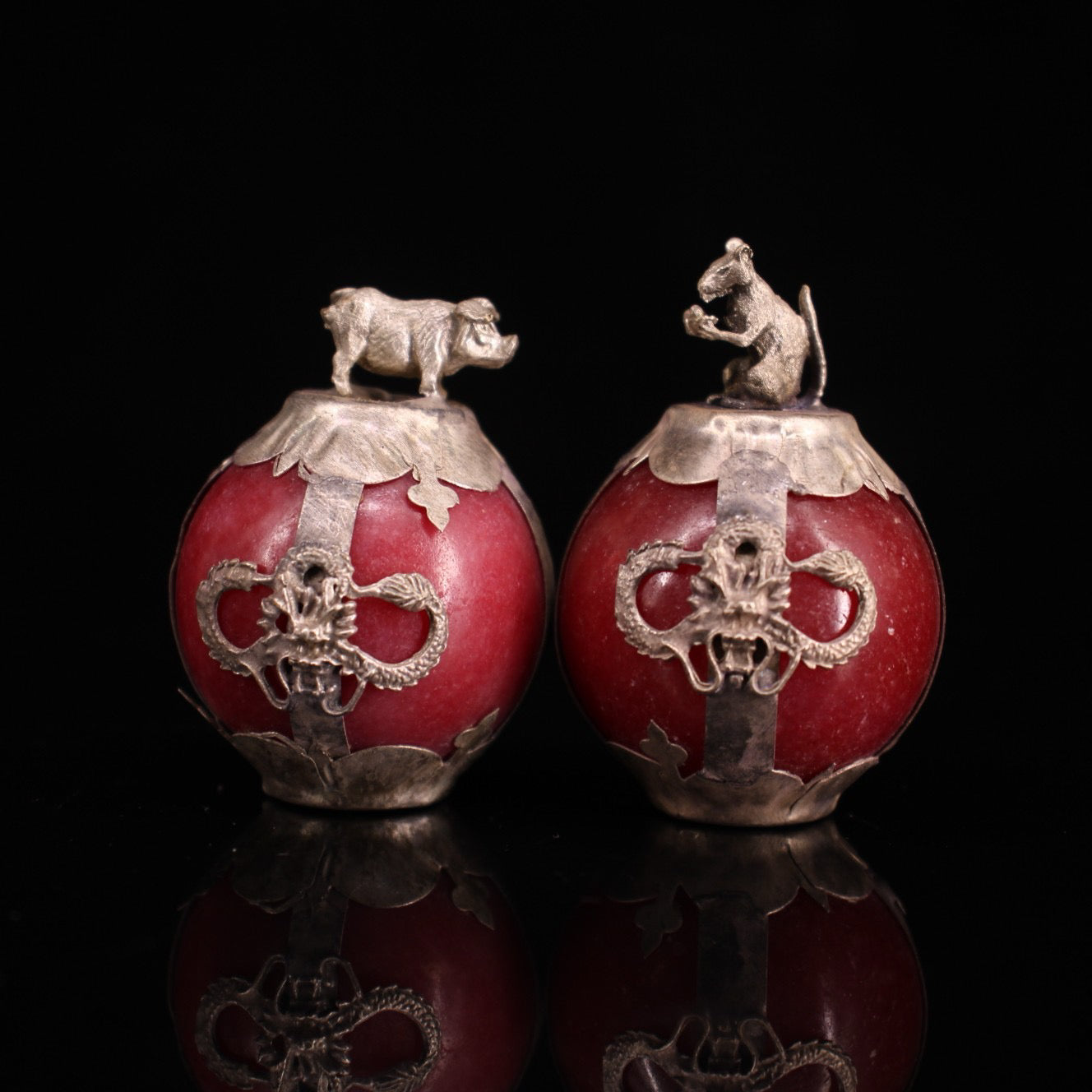 A set of Chinese antique silver wrapped jade zodiac balls