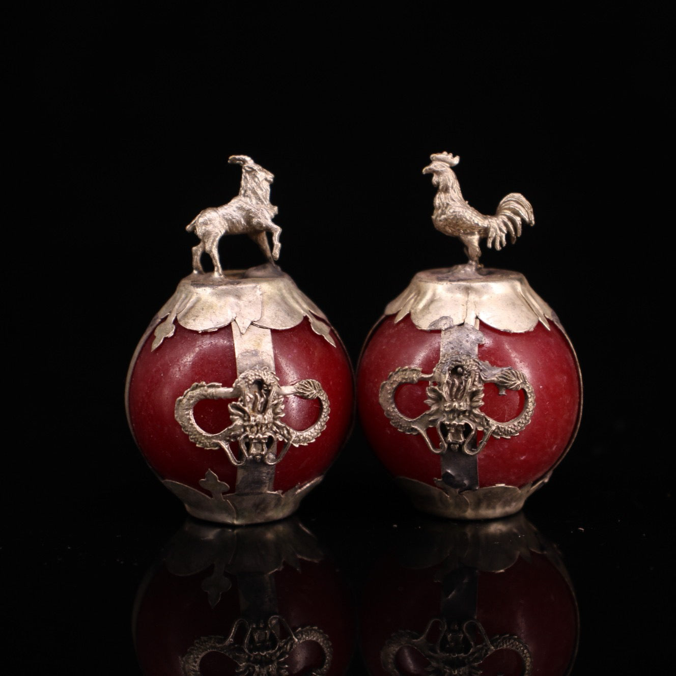 A set of Chinese antique silver wrapped jade zodiac balls