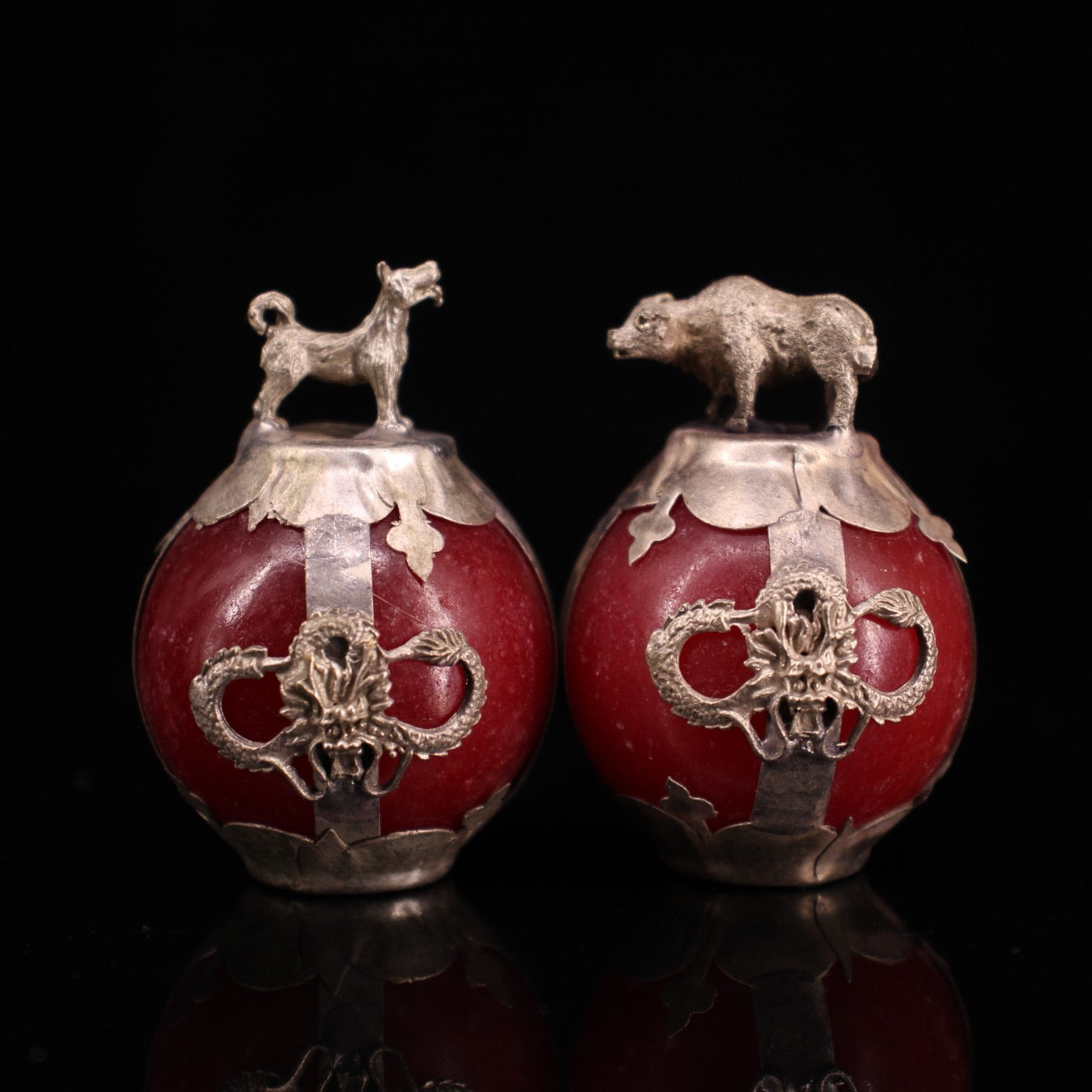 A set of Chinese antique silver wrapped jade zodiac balls