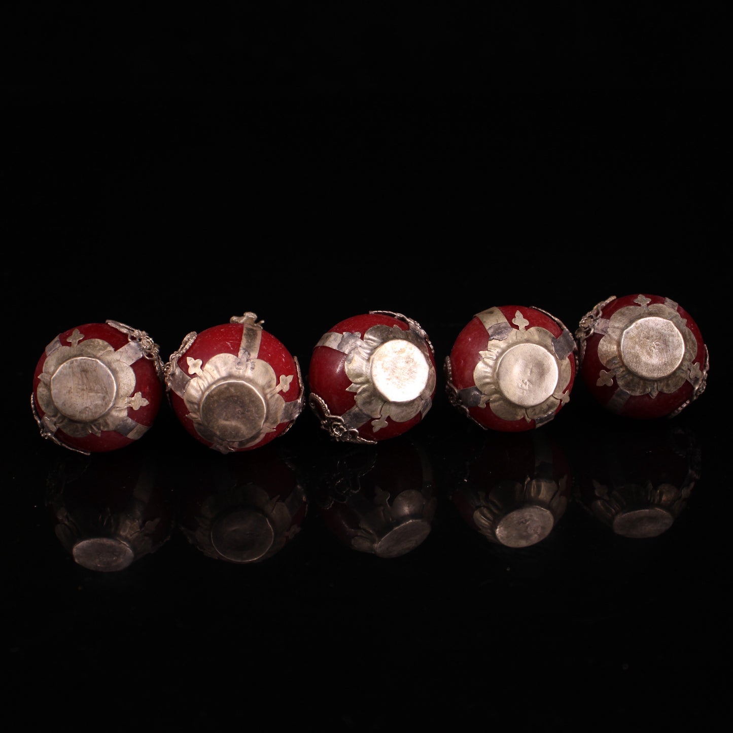 A set of Chinese antique silver wrapped jade zodiac balls