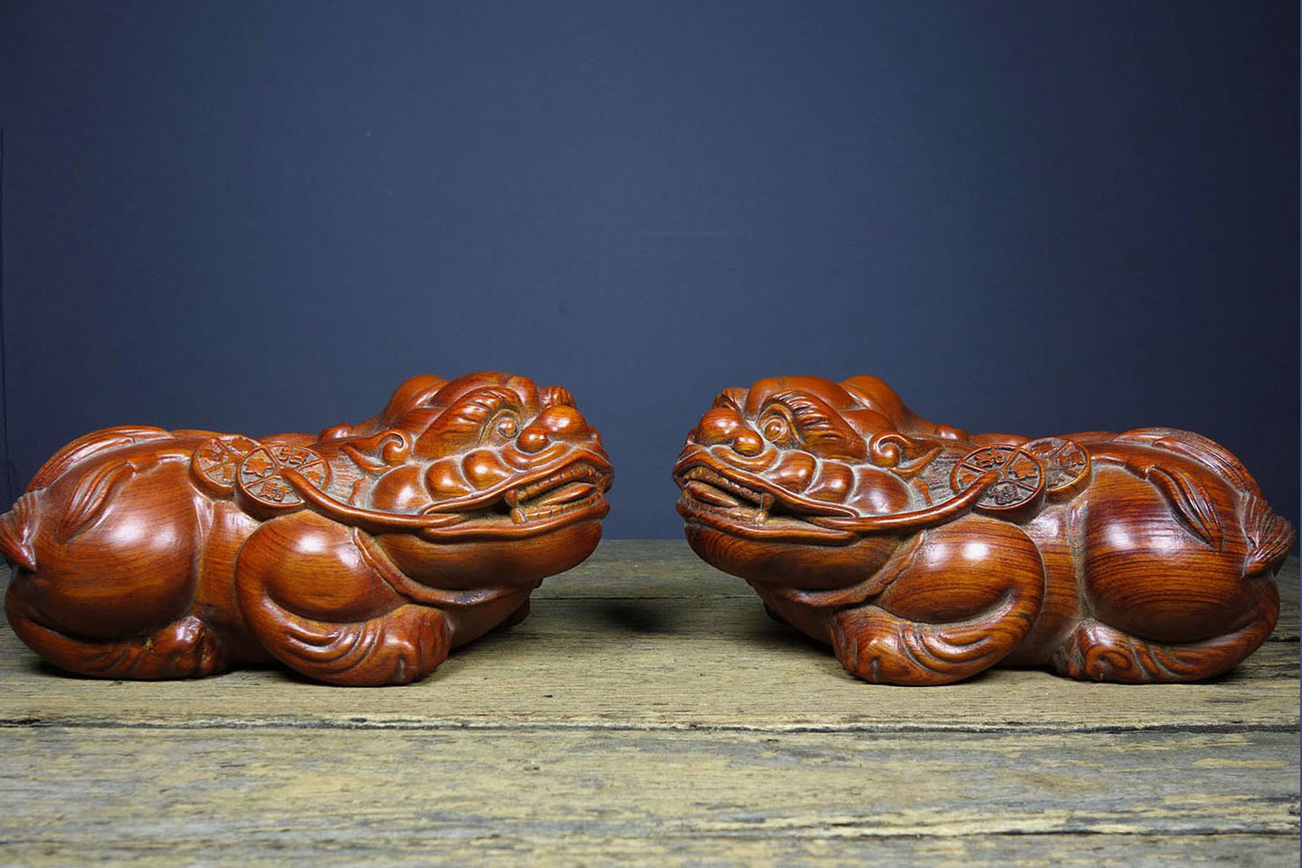 A pair of Chinese antique pear wood carvings attracting wealth and treasures, Pixiu