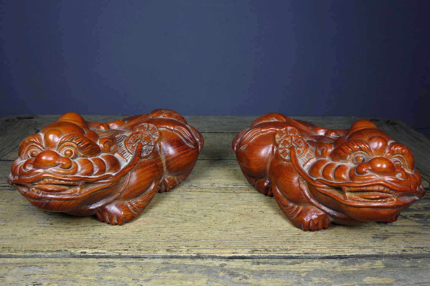 A pair of Chinese antique pear wood carvings attracting wealth and treasures, Pixiu