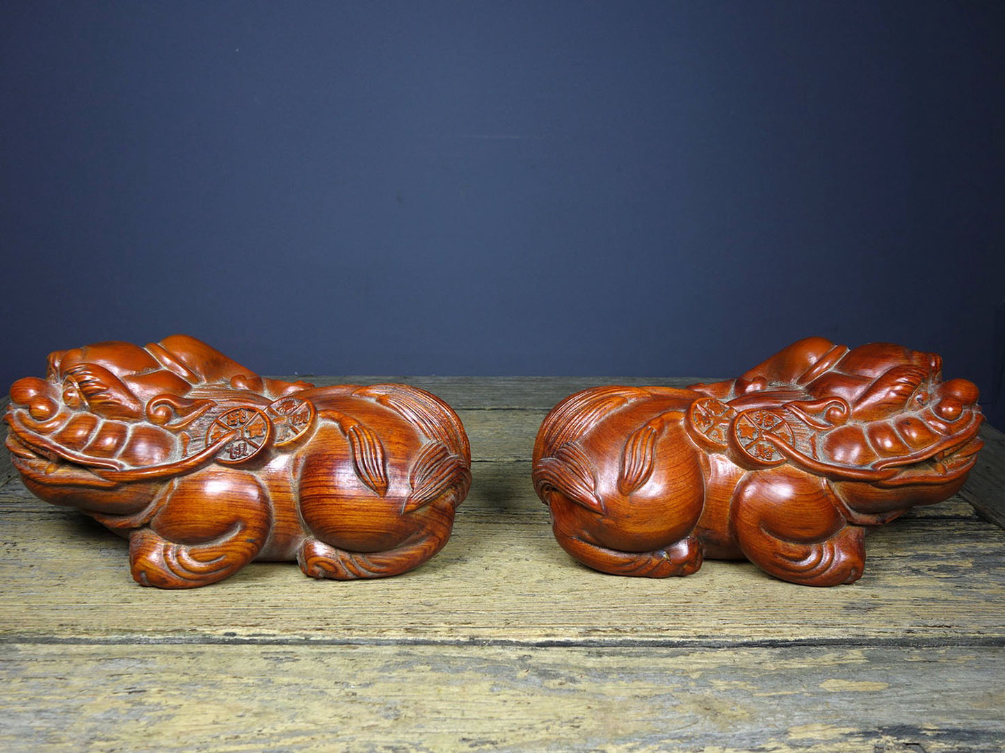 A pair of Chinese antique pear wood carvings attracting wealth and treasures, Pixiu