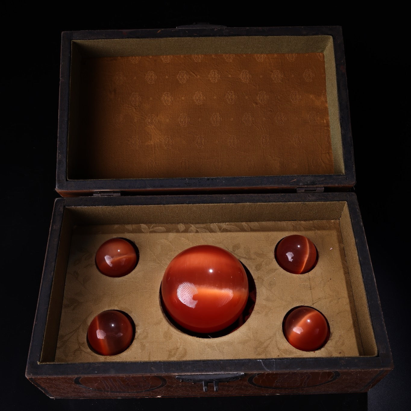 A box of Chinese antique cat's eye stone balls