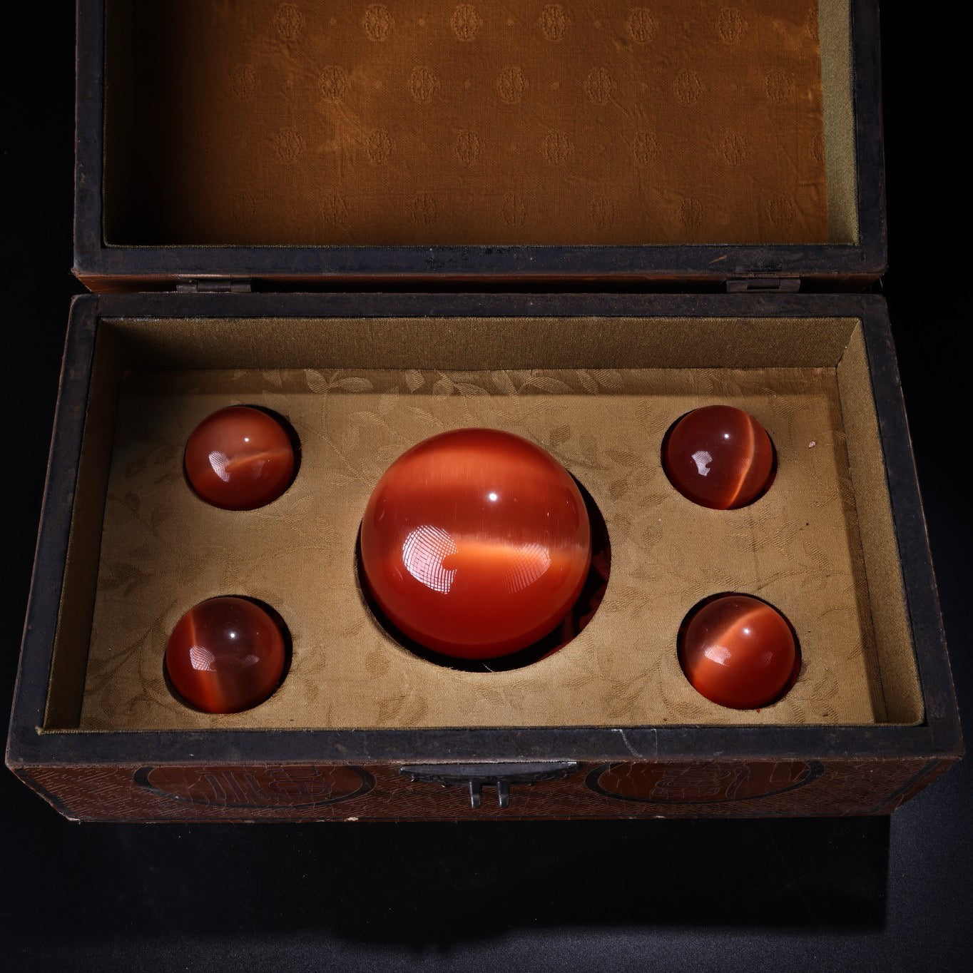 A box of Chinese antique cat's eye stone balls