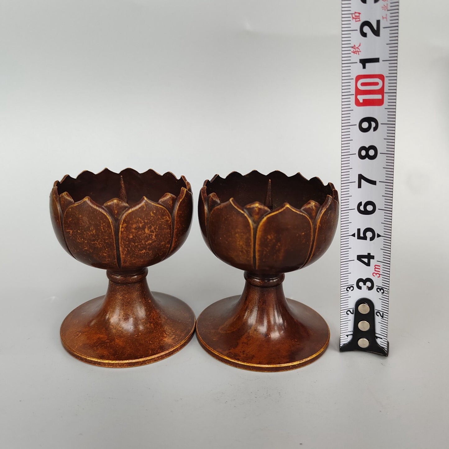 A pair of Chinese antique pure copper small lotus flower figurines