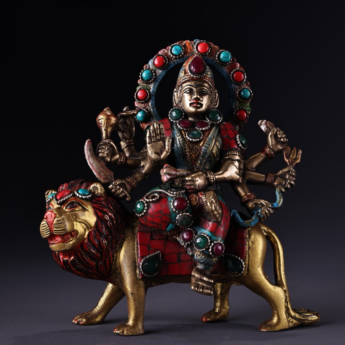 Chinese antique pure copper six armed lion riding guardian deity
