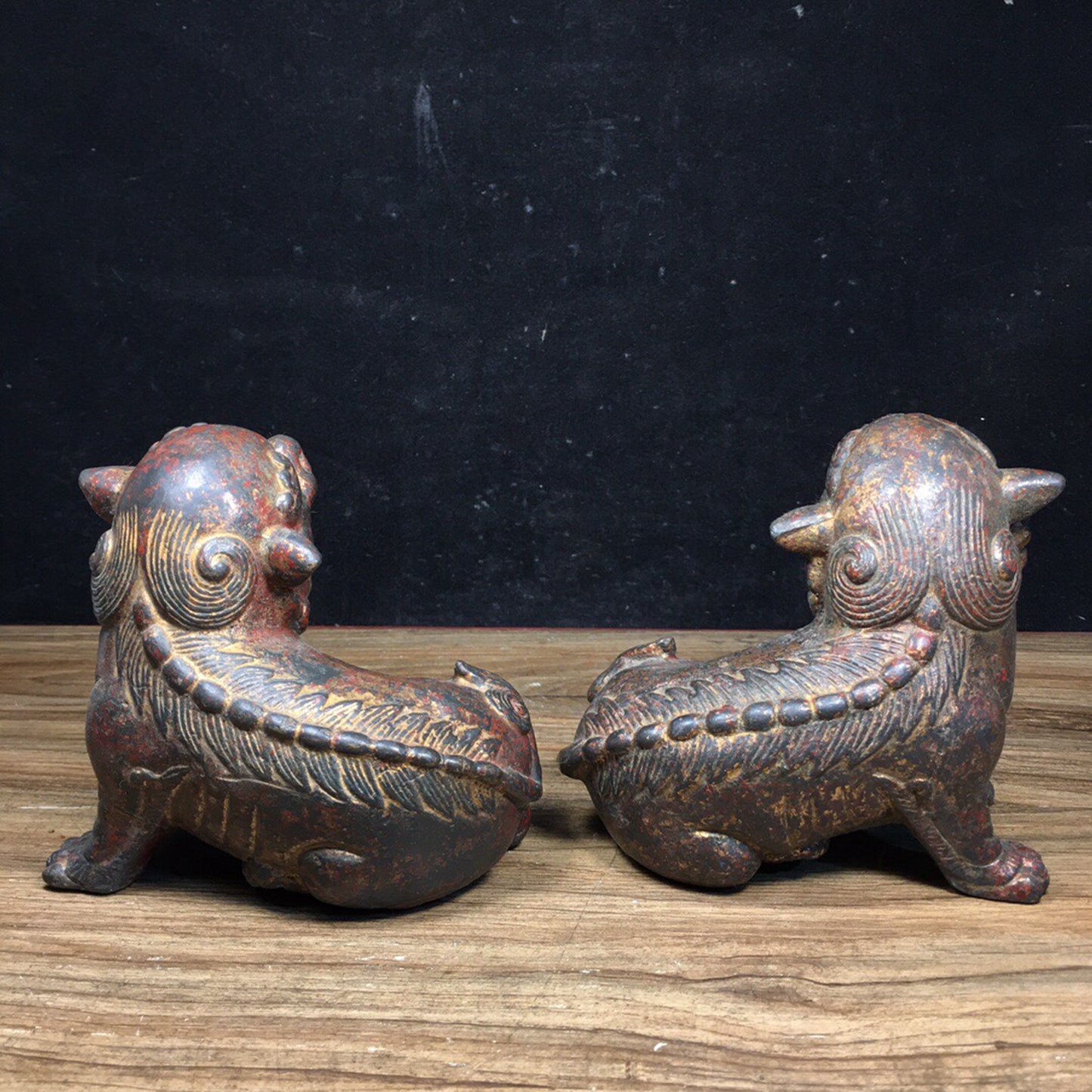 A pair of antique Chinese bronze lions