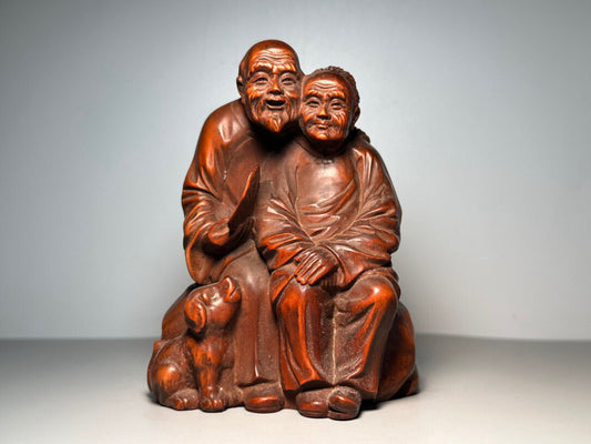 Chinese antique boxwood carving of an old man and wife
