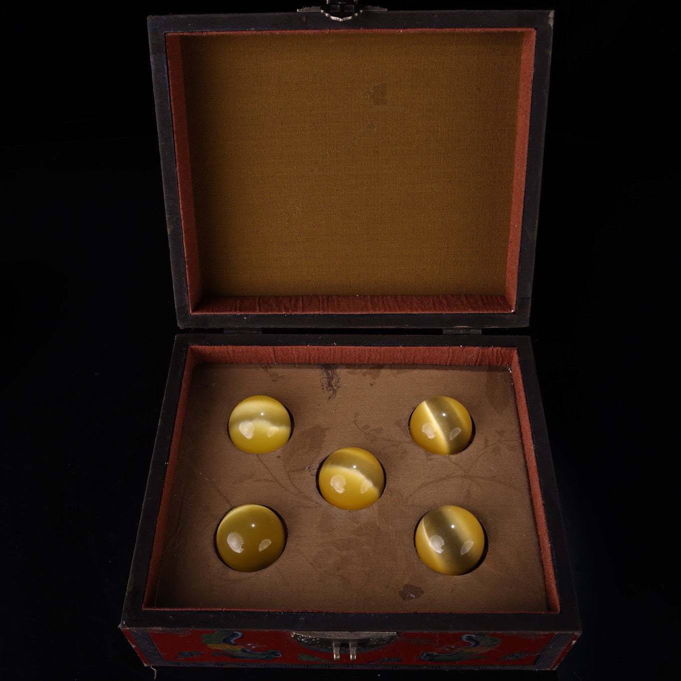 A box of Chinese antique cat's eye balls