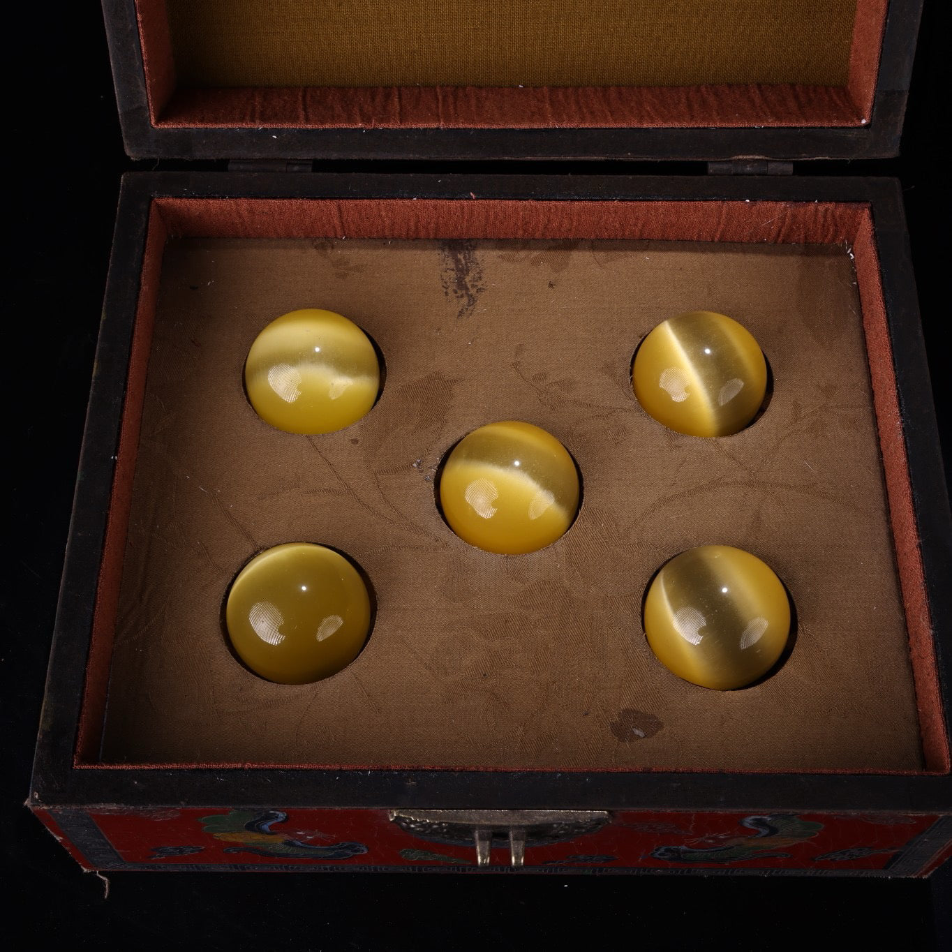 A box of Chinese antique cat's eye balls