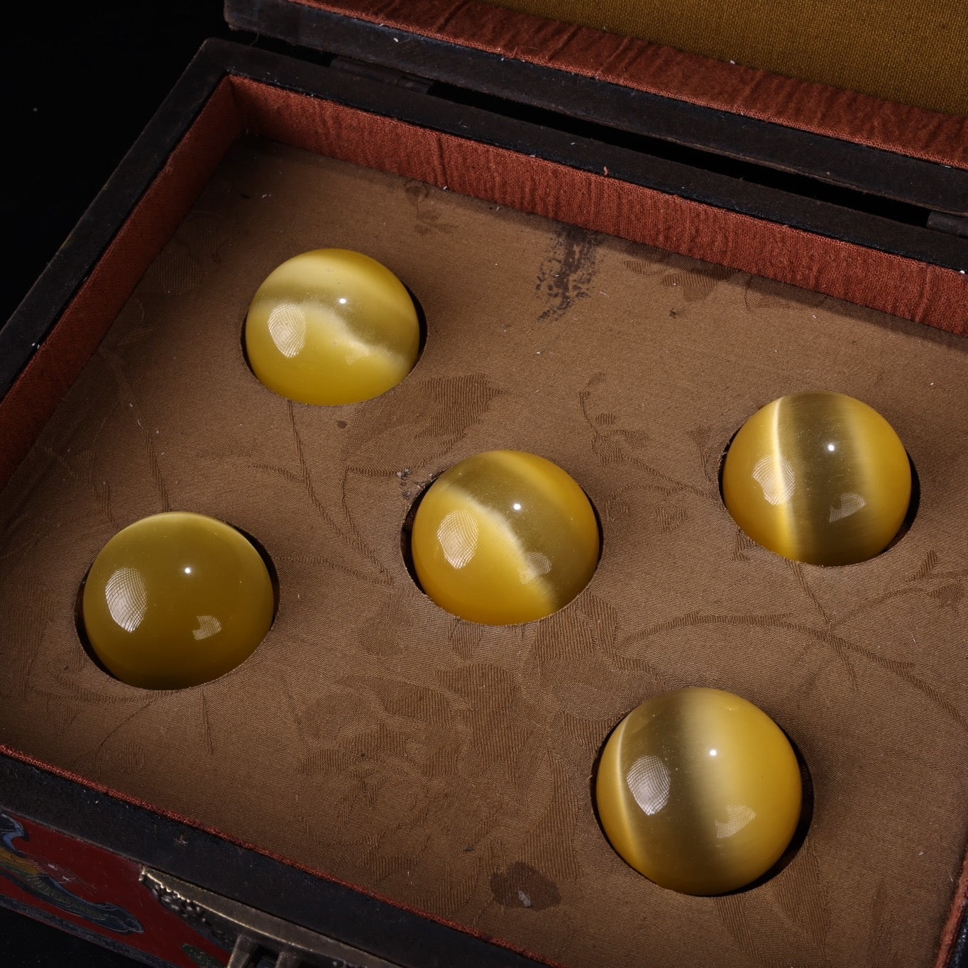 A box of Chinese antique cat's eye balls