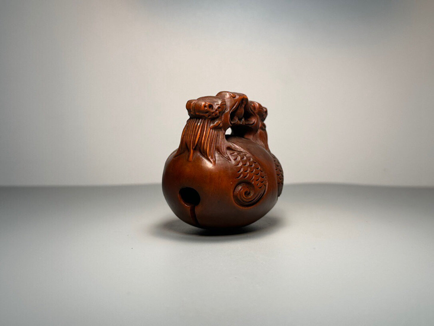 Chinese antique boxwood carving with double dragons playing with pearls and wooden fish