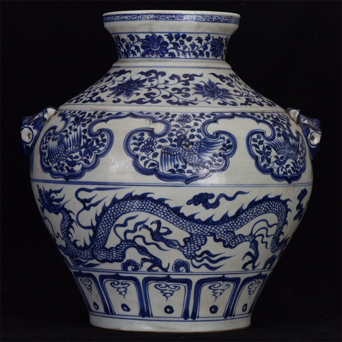 Chinese antique blue and white dragon patterned double lion ear pan jar