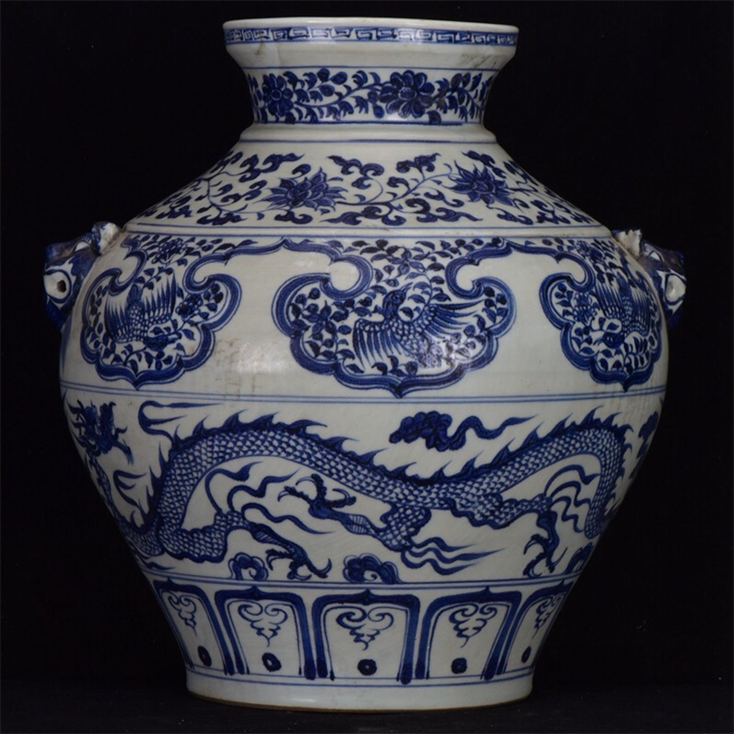 Chinese antique blue and white dragon patterned double lion ear pan jar