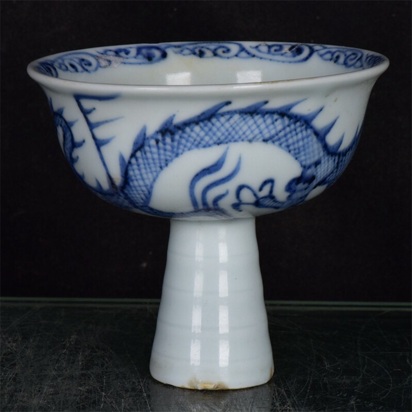 Chinese antique blue and white dragon patterned high footed bowl