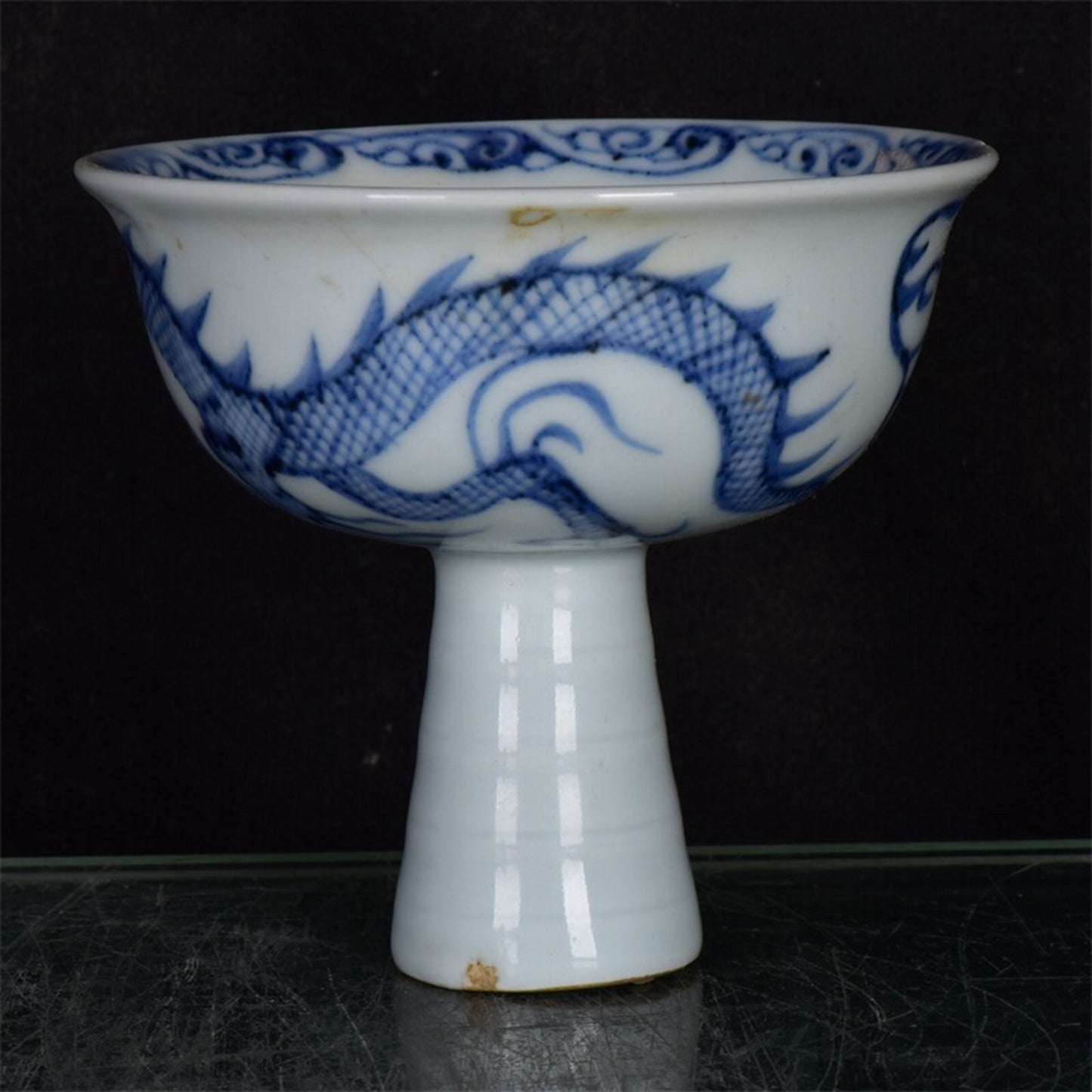 Chinese antique blue and white dragon patterned high footed bowl