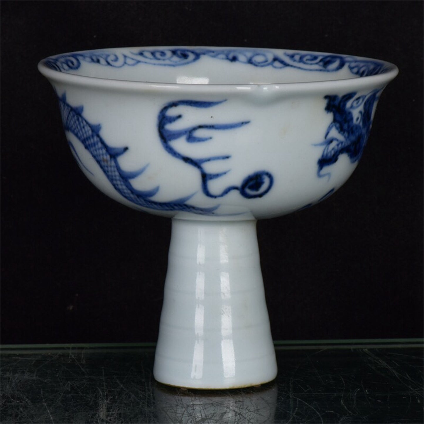 Chinese antique blue and white dragon patterned high footed bowl