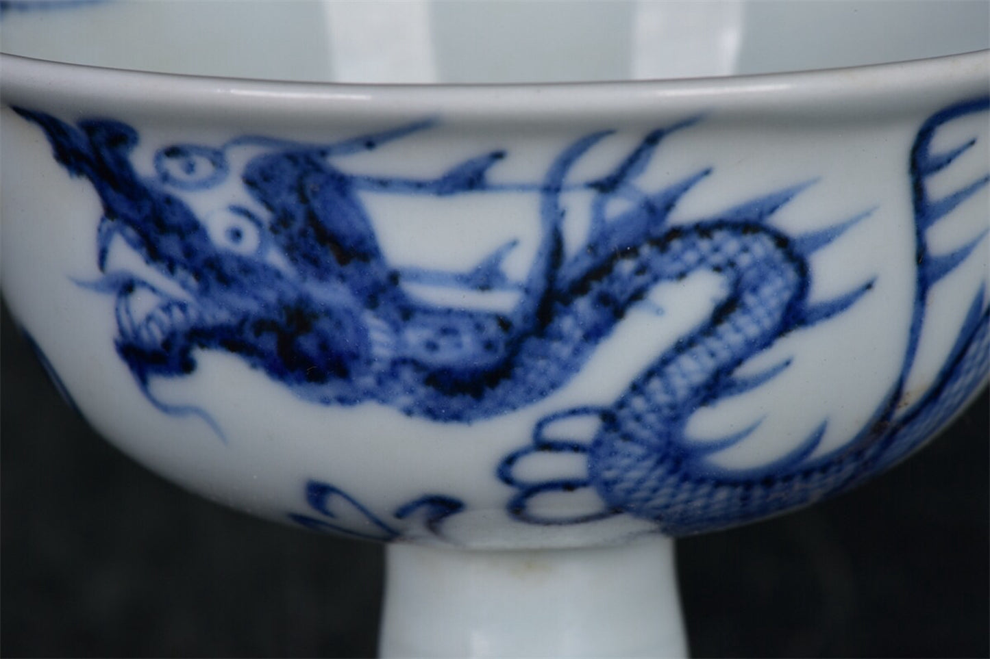 Chinese antique blue and white dragon patterned high footed bowl