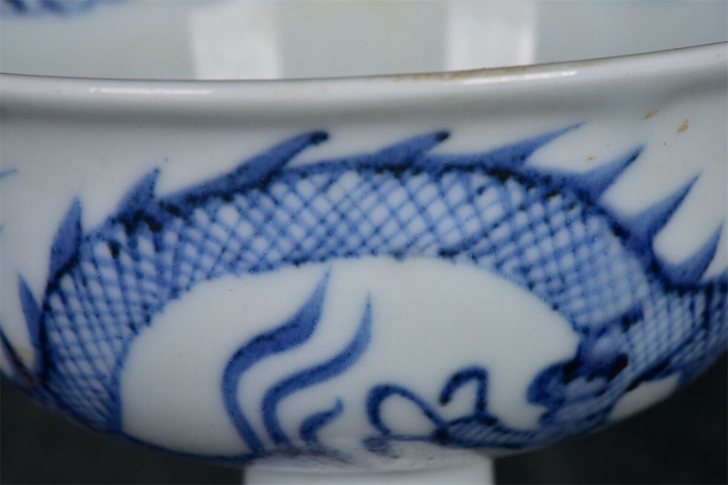 Chinese antique blue and white dragon patterned high footed bowl