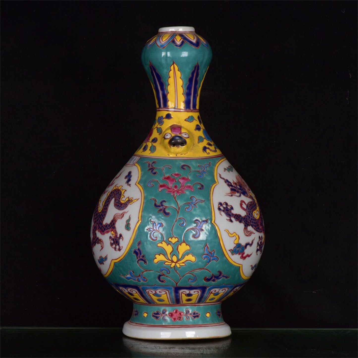 Chinese antique green glazed dragon patterned garlic bottle