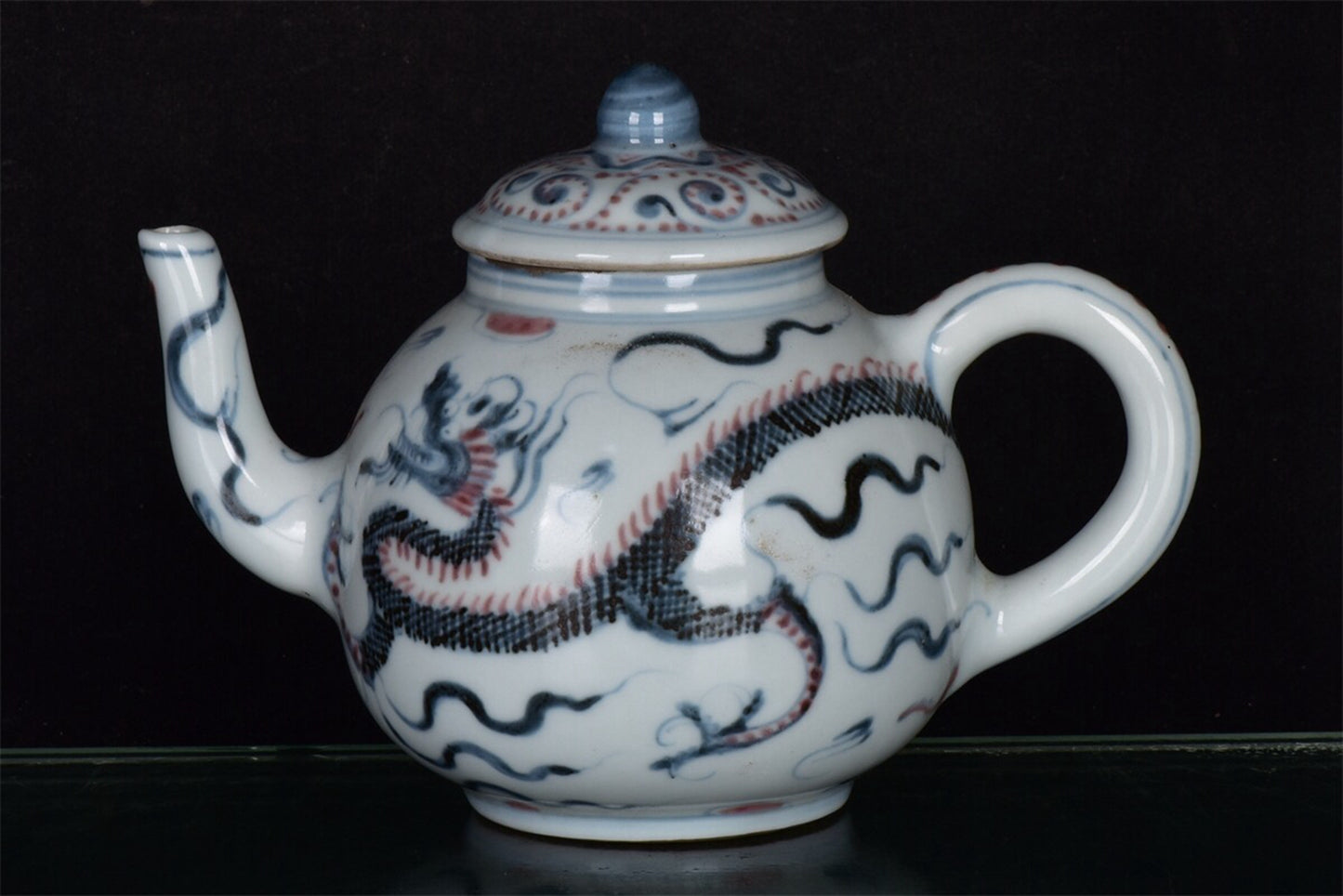 Chinese antique blue and white glazed red dragon patterned teapot