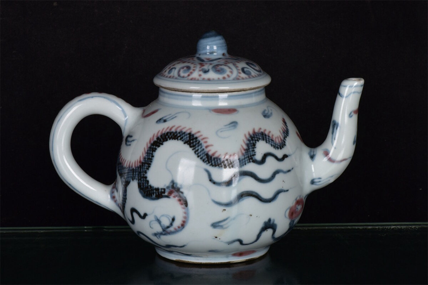 Chinese antique blue and white glazed red dragon patterned teapot