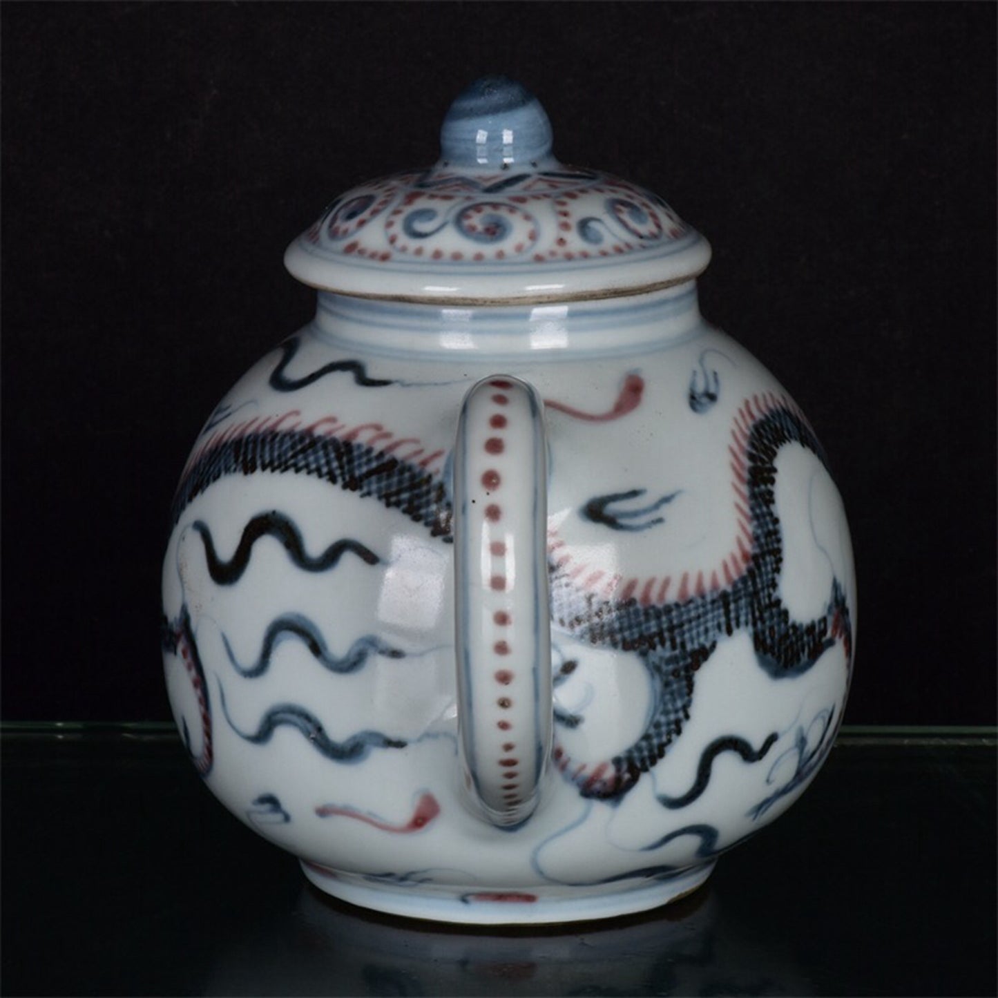 Chinese antique blue and white glazed red dragon patterned teapot