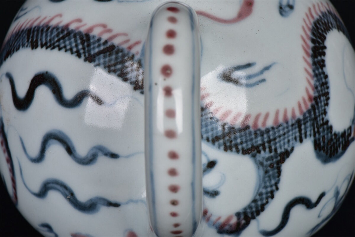 Chinese antique blue and white glazed red dragon patterned teapot