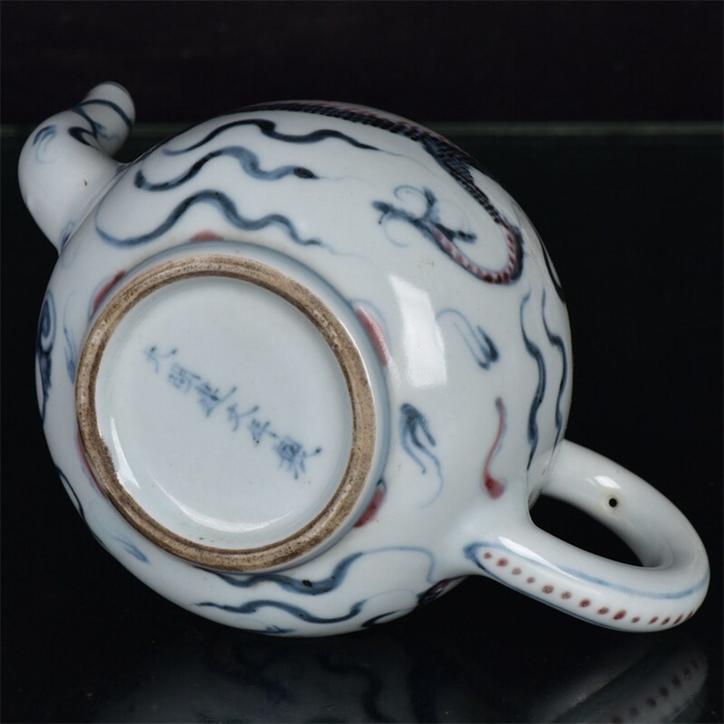 Chinese antique blue and white glazed red dragon patterned teapot