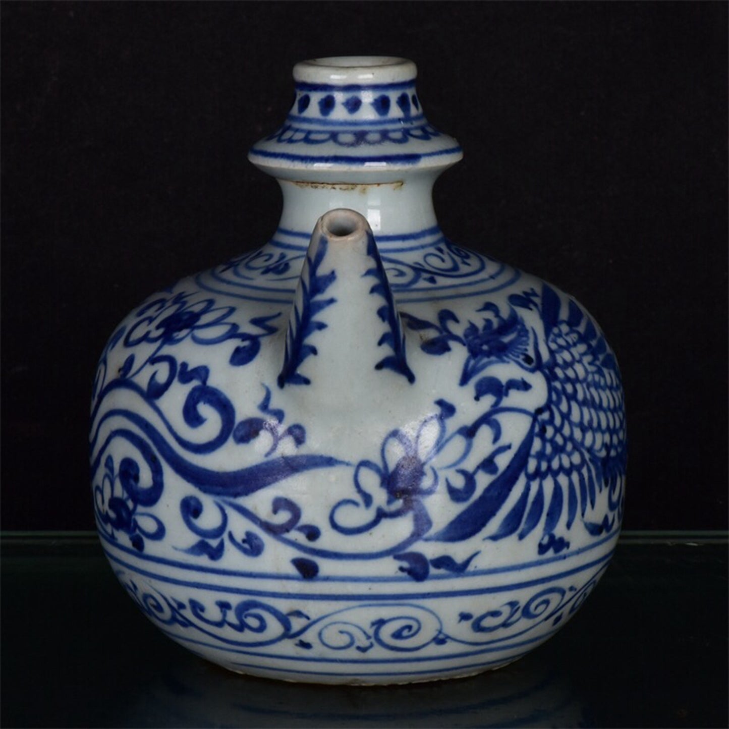 Chinese antique blue and white intertwined phoenix patterned clean bottle