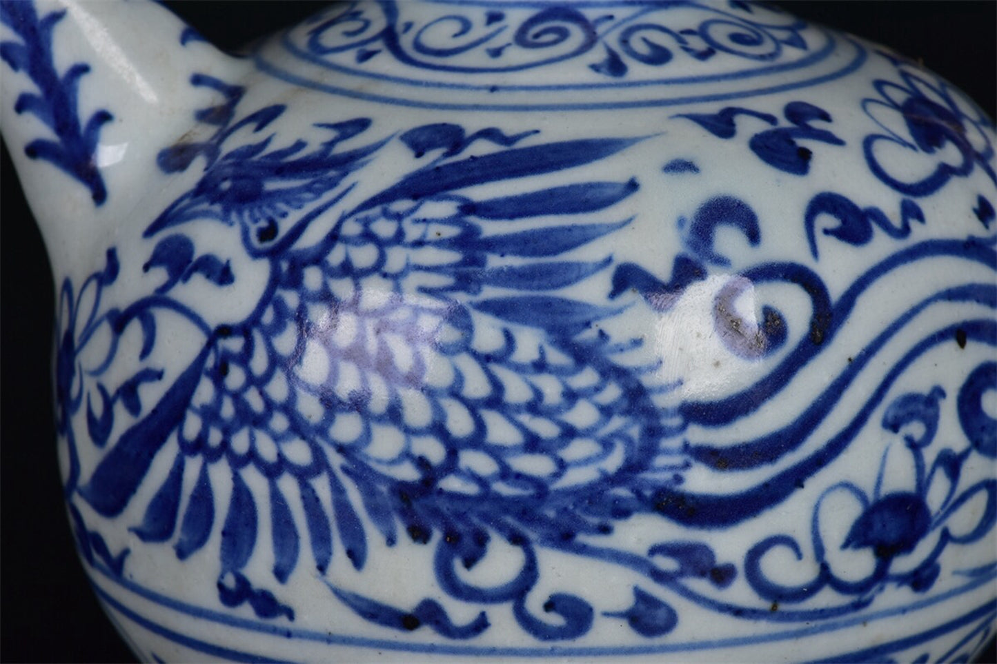Chinese antique blue and white intertwined phoenix patterned clean bottle