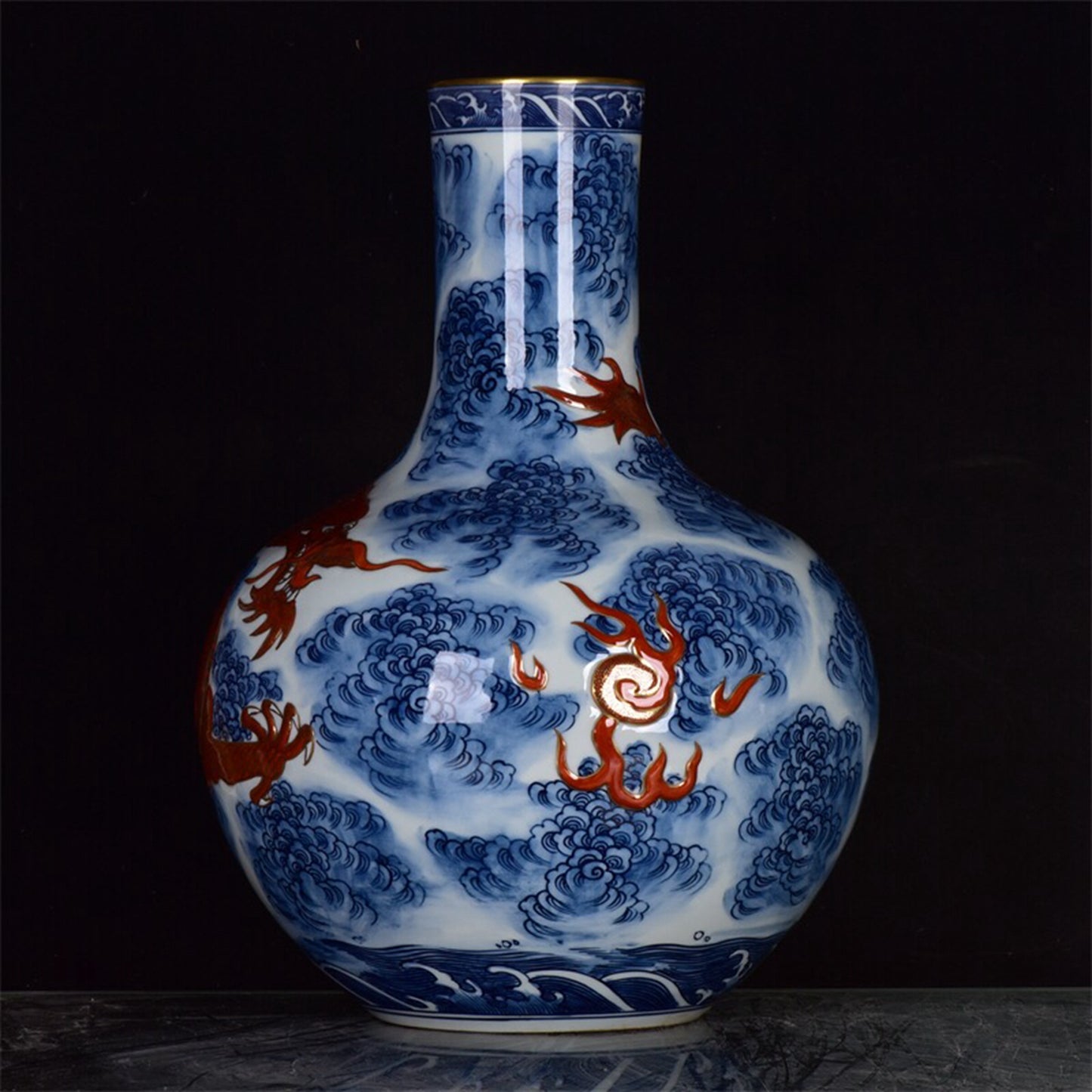 Chinese antique blue and white glazed red gilded auspicious cloud dragon patterned celestial ball bottle