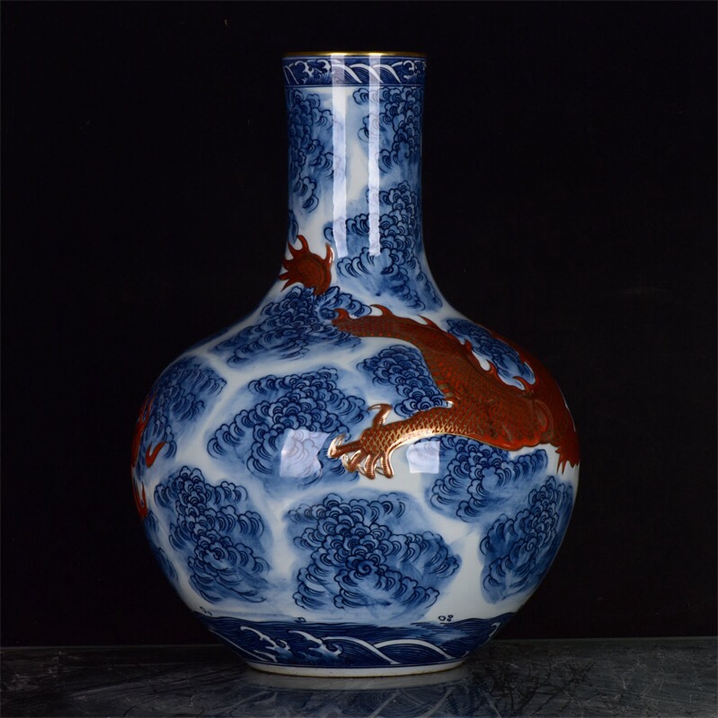 Chinese antique blue and white glazed red gilded auspicious cloud dragon patterned celestial ball bottle