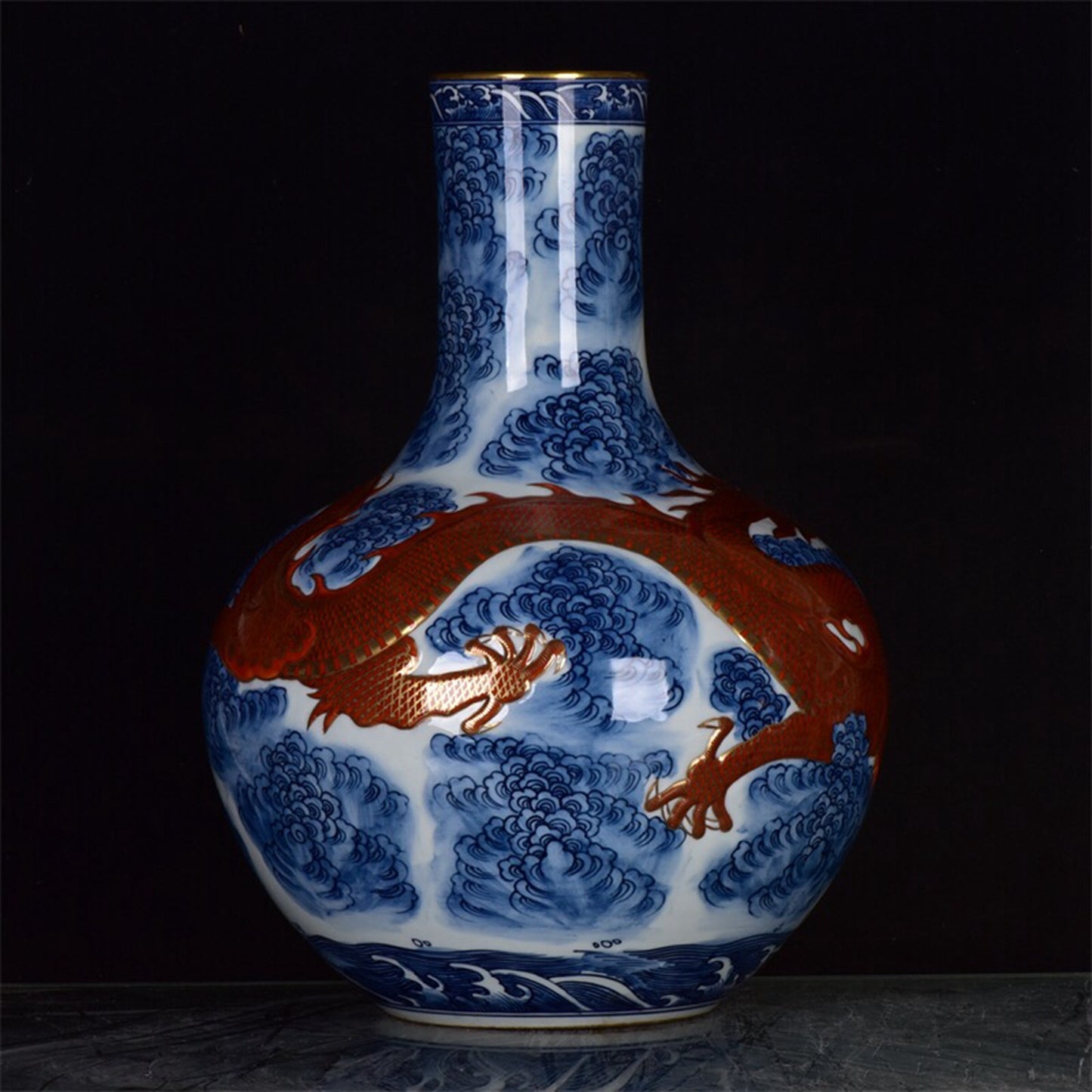 Chinese antique blue and white glazed red gilded auspicious cloud dragon patterned celestial ball bottle