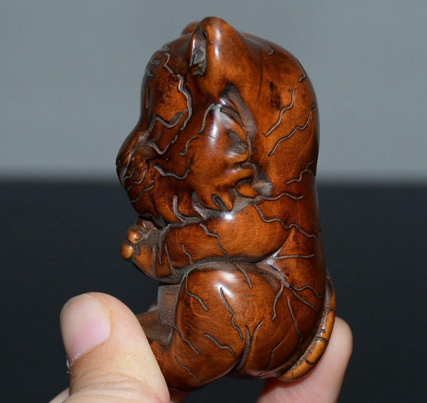Chinese antique small leaf boxwood small tiger handle