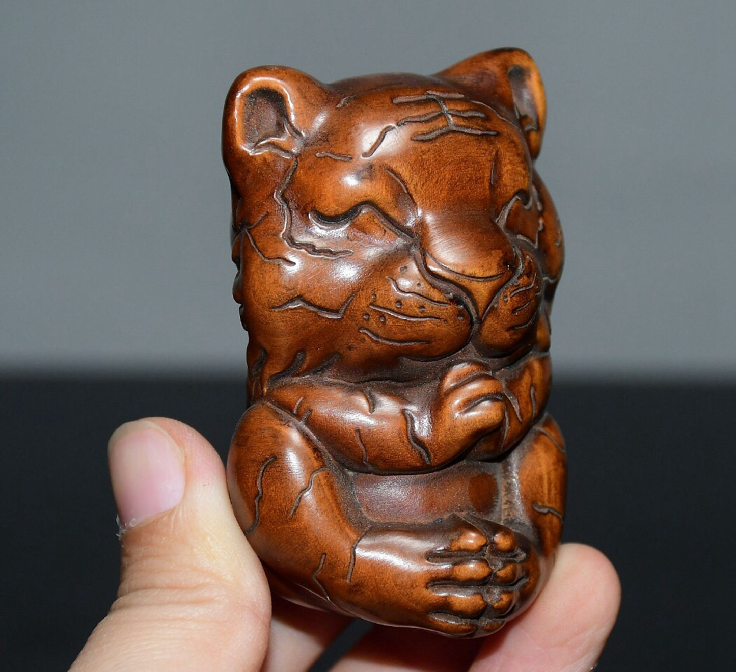 Chinese antique small leaf boxwood small tiger handle