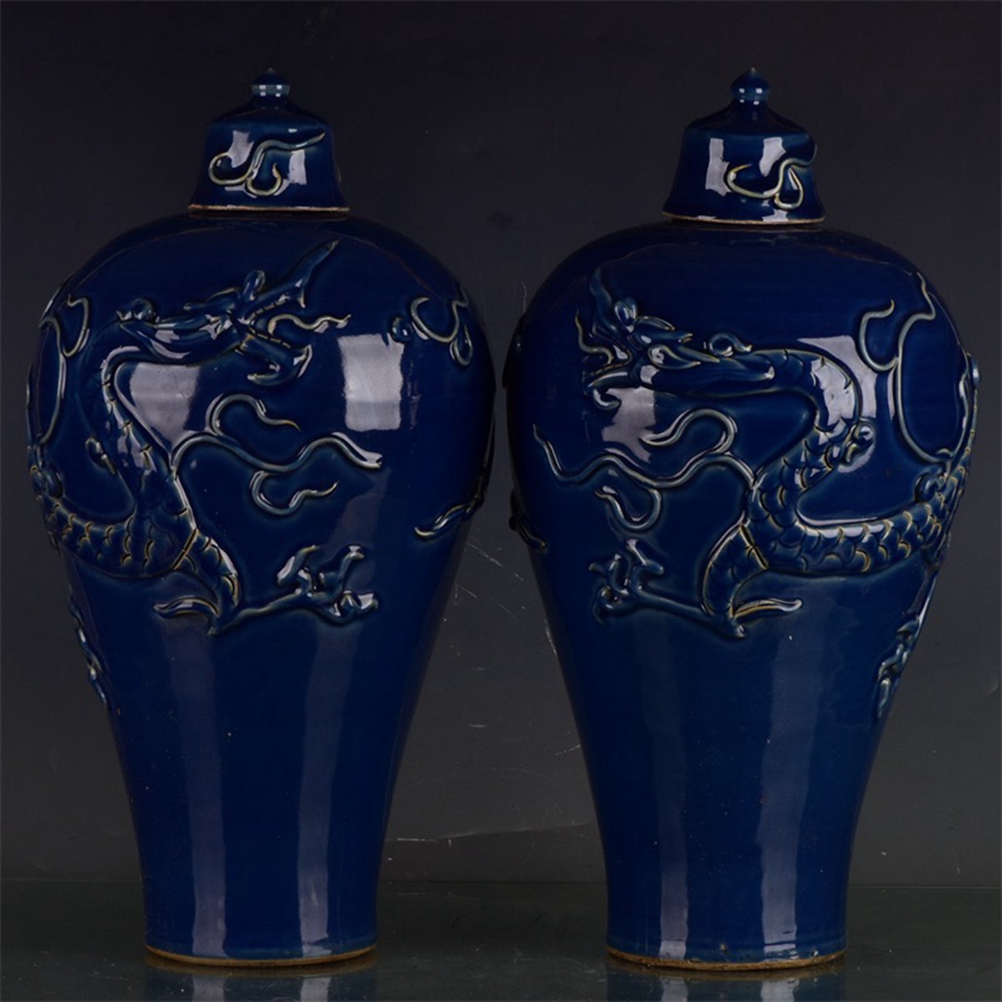 Chinese antique Ji blue relief dragon patterned plum vase