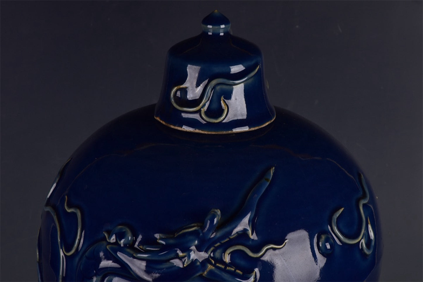 Chinese antique Ji blue relief dragon patterned plum vase