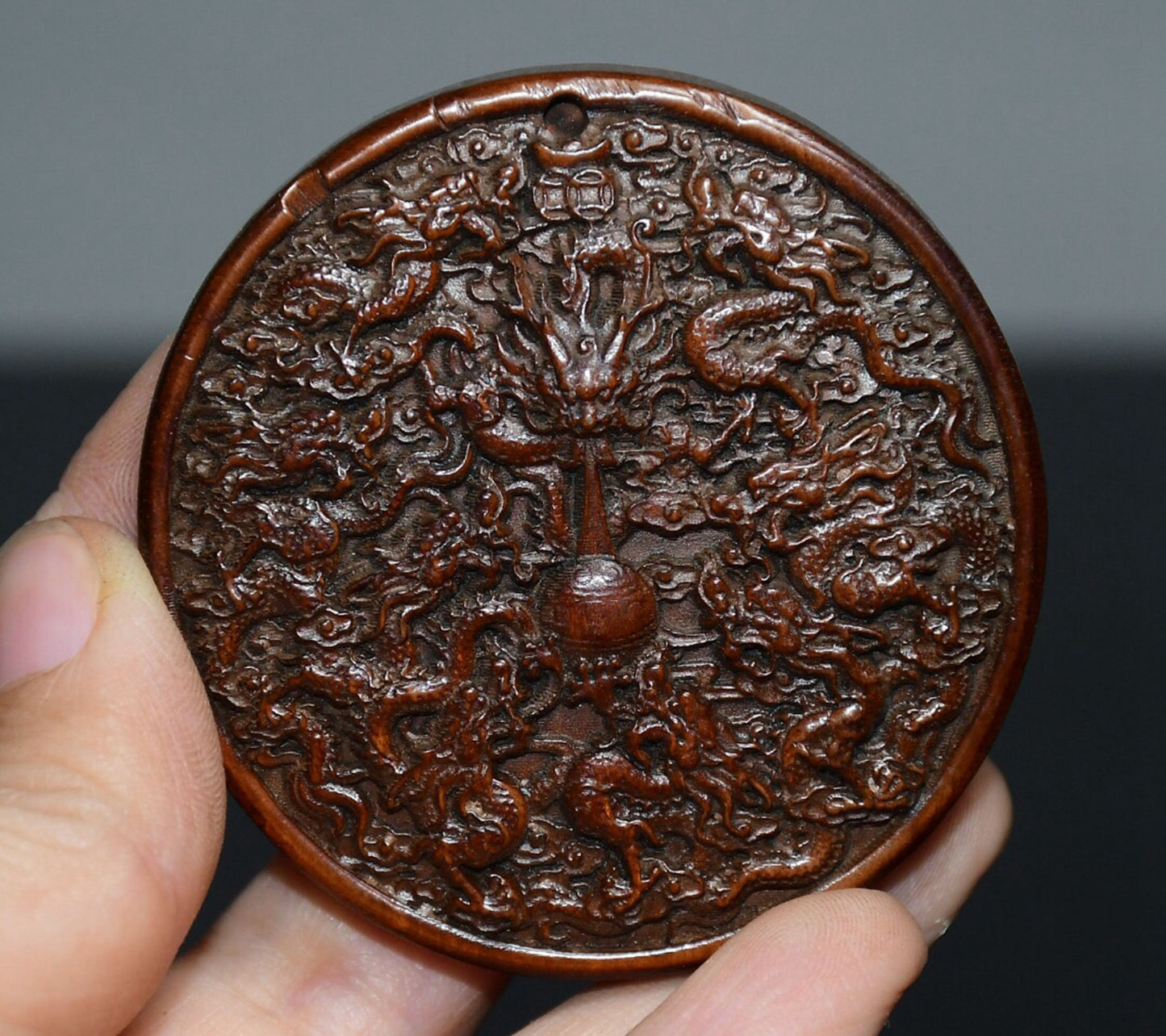 Chinese antique boxwood Nine Dragon pendant