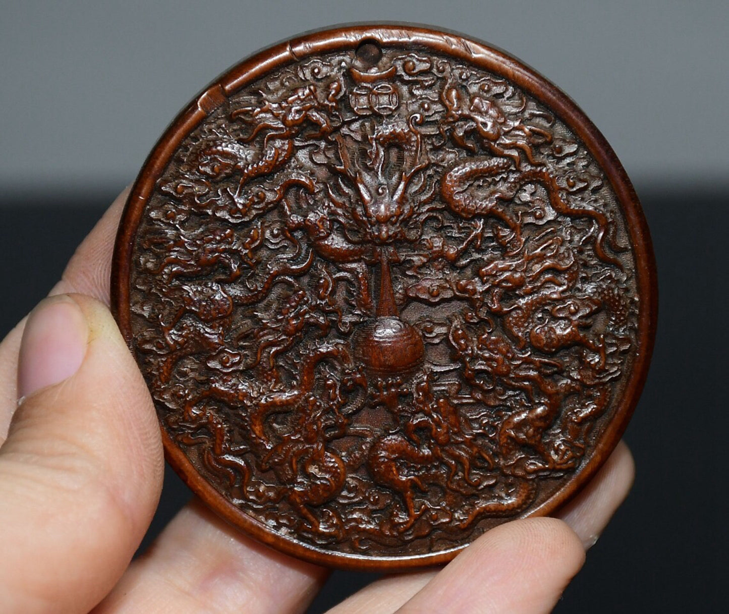 Chinese antique boxwood Nine Dragon pendant