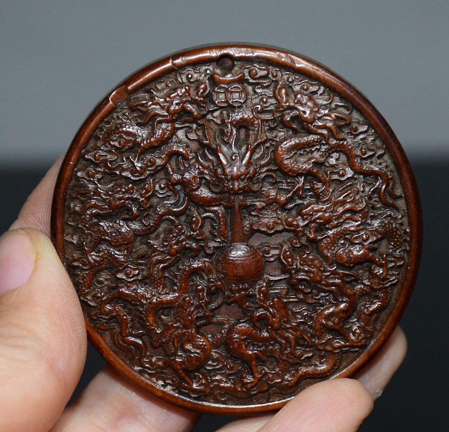 Chinese antique boxwood Nine Dragon pendant