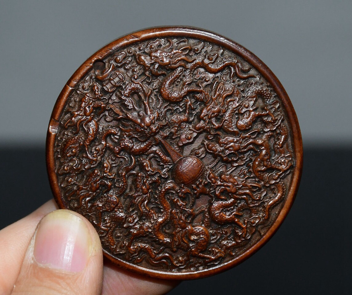 Chinese antique boxwood Nine Dragon pendant