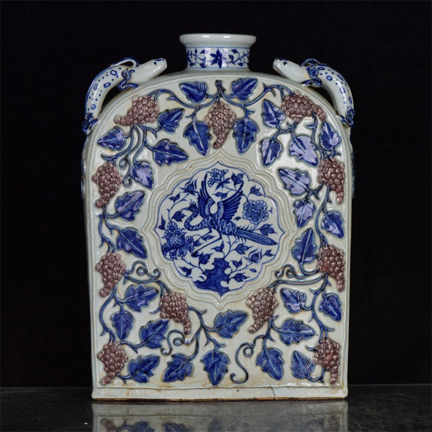 Chinese antique blue and white glazed red relief bottle with multiple grape patterns and a square shape